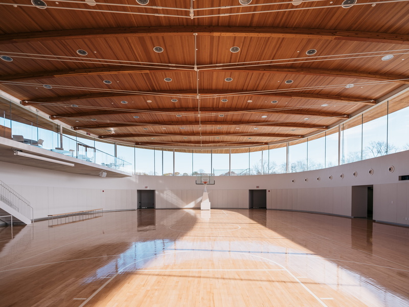 ceiling, glass - material, hardwood floor, day, sunlight, clean, 8K, photo, architecture, indoors, brown, gym, wood - material, wall - building feature