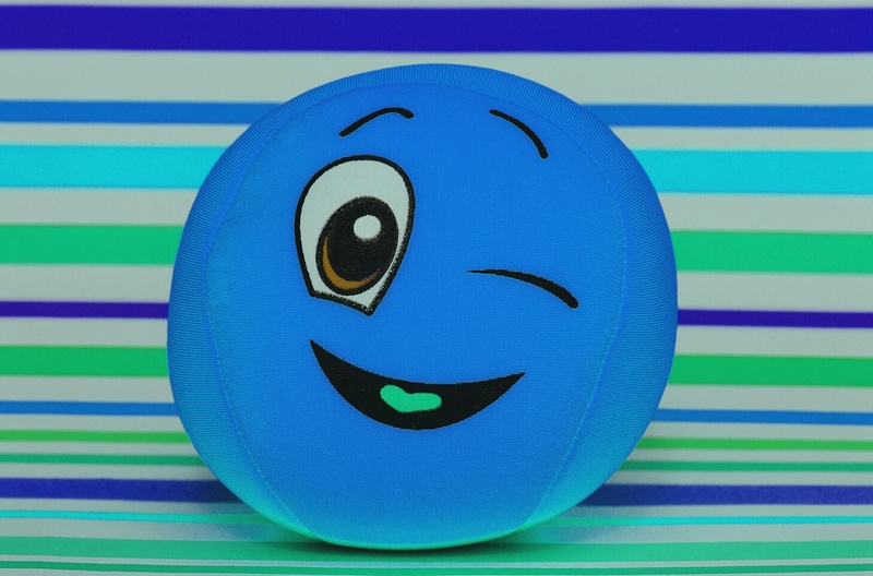 no people, themselves, inflatable, creativity, striped, blue, anthropomorphic, still life, wink, indoors, ball, friendly, fabric, craft, cute, funny, face