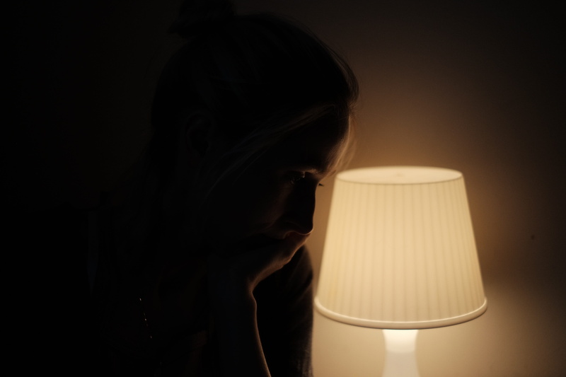 profile view, lamp, hairstyle, evening, lamplight, illuminated, mystery, closeup, women, electricity, electric light, portrait, electric lamp, dramatic