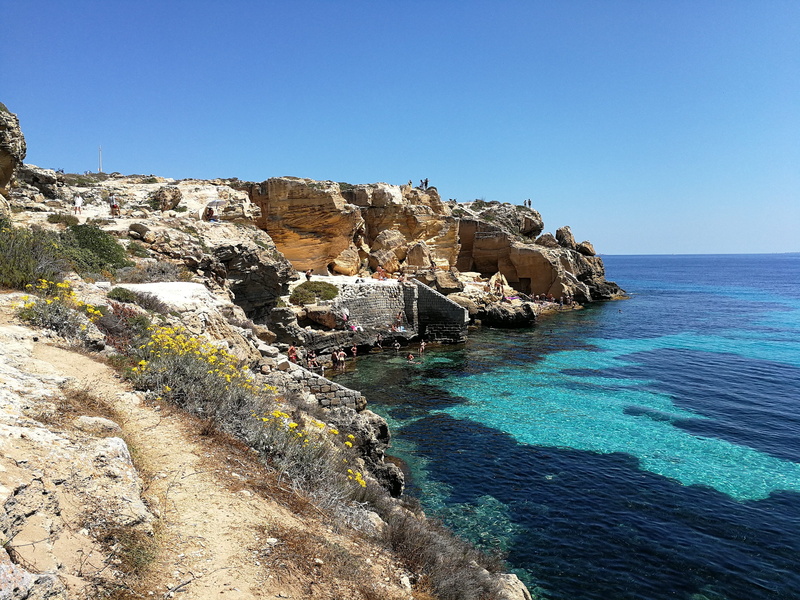 land, 4K, outdoors, water, beauty in nature, nature, scenics - nature, cliff, rocks, horizon over water, blue, tranquil scene, no people, rock, eroded