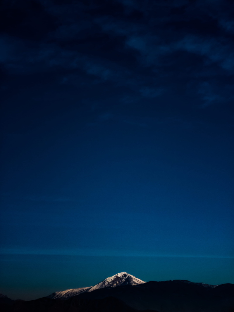 silhouette, sea, nature, tranquil scene, shoreline, outdoors, mountain, night, outer space, architecture, photo, remote, star - space, space, astronomy