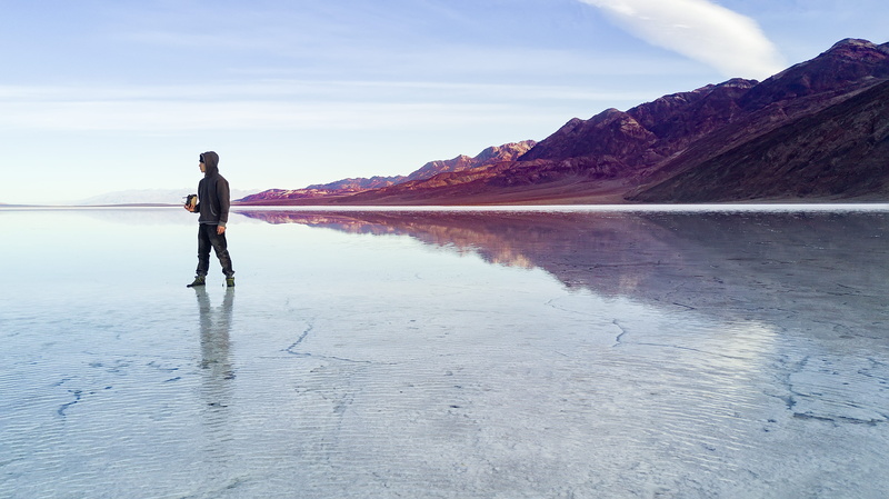 lifestyles, badwater basin, portrait, non-urban scene, reflection, mountain, sea, drone, beauty in nature, tranquil scene, bad water, water, tranquility