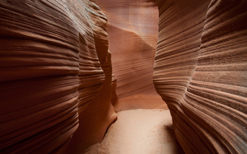 pattern, brown, logo, land, layered, nature, physical geography, rock formation, eroded, sandstone, travel, rock - object, no people, solid, canyon, desert