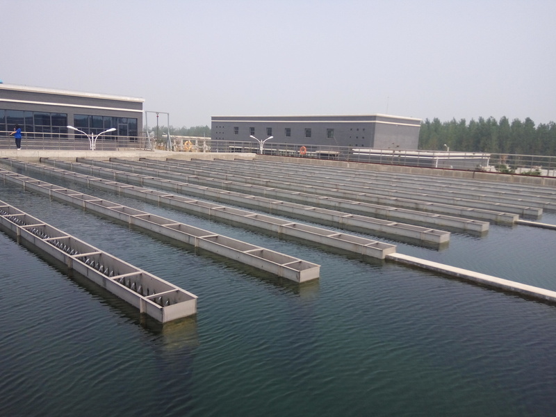 rail transportation, daytime, building exterior, water treatment, architecture, sky, water plant, lake, day, body, no people, renewable energy, freight transportation
