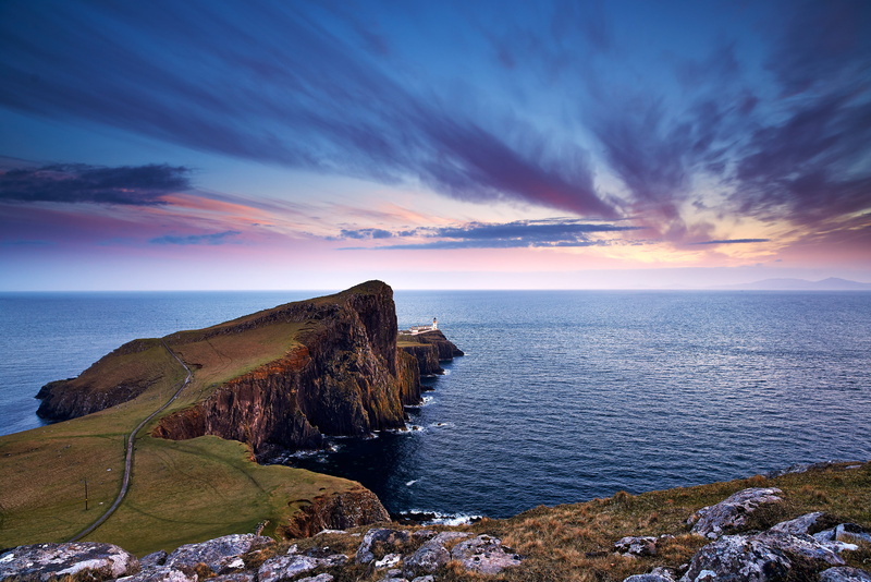 stones, sea, Neist Point, rocky coastline, lighthouse, clouds, coastline, land, horizon over water, the sky, water, sunset, Cape, horizon, tranquility