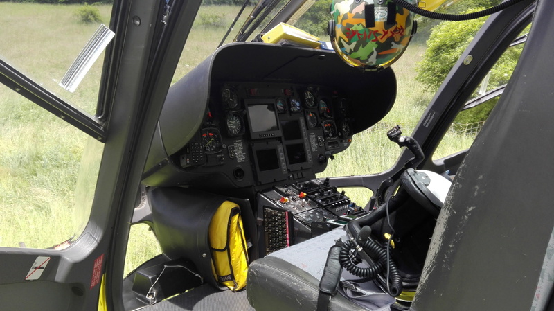 outdoors, no people, glass - material, helicopter, complexity, christophorus, close-up, vehicle interior, air vehicle, land vehicle, rotor, control, army