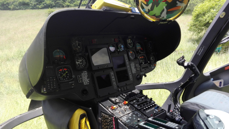 air vehicle, rotor, control, transportation, stationary, aerospace industry, ambulance helicopter, vehicle interior, land vehicle, outdoors, helicopter