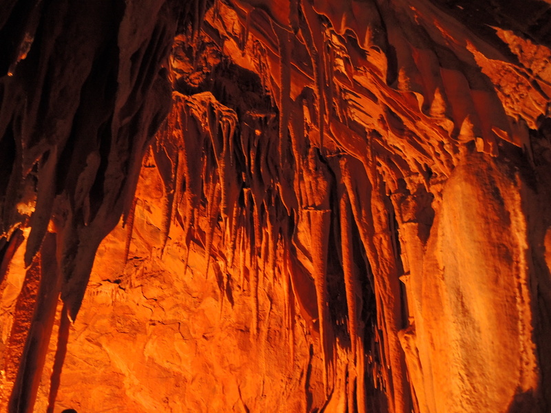 sandstone, rock formation, close-up, outdoors, eroded, solid, travel destinations, non-urban scene, nature, dragons lair, low angle view, day, cave, mountains