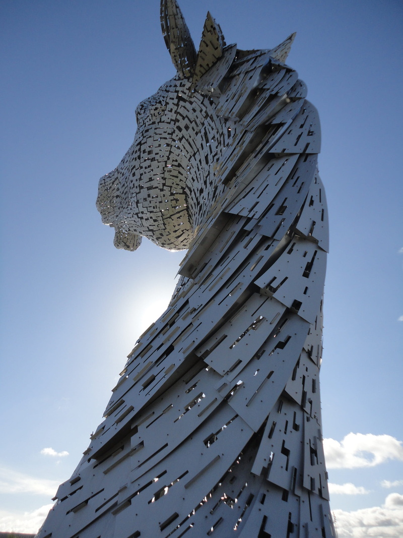figure, creativity, sunlight, monuments, representation, nature, religion, built structure, belief, sky, metal, low angle view, statue, art and craft, sculpture