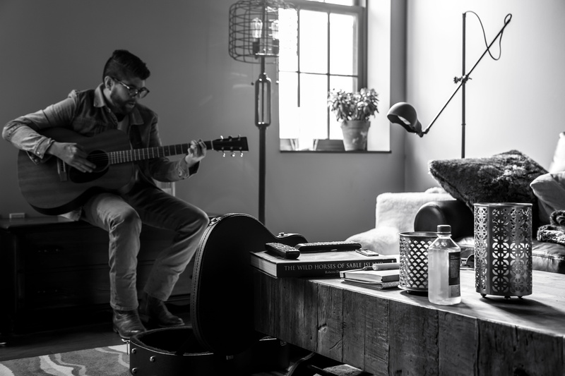 5K, buffalo, one person, lifestyles, men, indoors, string instrument, united states, full length, acoustic guitar, arts culture and entertainment, guitar