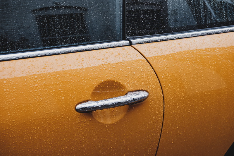 home decor, tire, drop, emblem, spoke, door, mode of transportation, close-up, alloy wheel, vehicle, sphere, window, mirror, trademark, glass - material