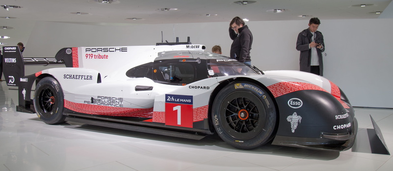 motor vehicle, business, vehicle, mature men, coupe, mode of transportation, sales occupation, buying, consumerism, bumper, formula one, sports, person