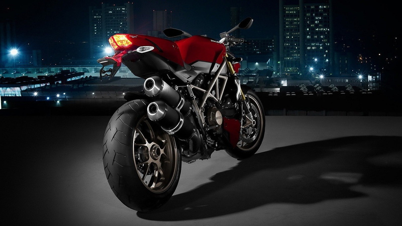 sports helmet, land vehicle, wheel, street, vehicle, Ducati, city, sport, dark, crash helmet, illuminated, men, motorcycle, cityscape, transportation, helmet