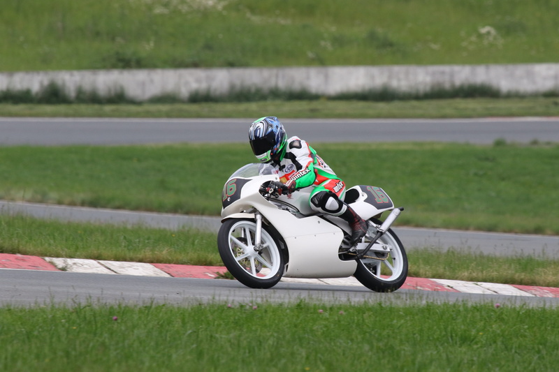 headwear, ride, team limitless, land vehicle, outdoors, motorcycle racing, riding, jens wasiak, motorcycle, biker, driving, helmet, sport, motion, 125cc honda