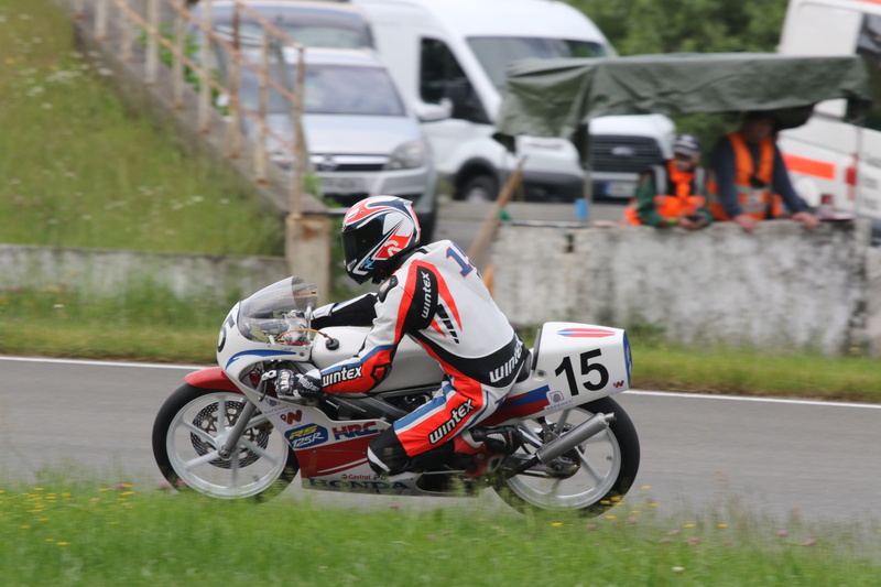 125cc honda, helmet, outdoors, german championships, 5K, sport, day, riding, jens wasiak, focus on foreground, safety, extreme sports, motorcycle, transportation