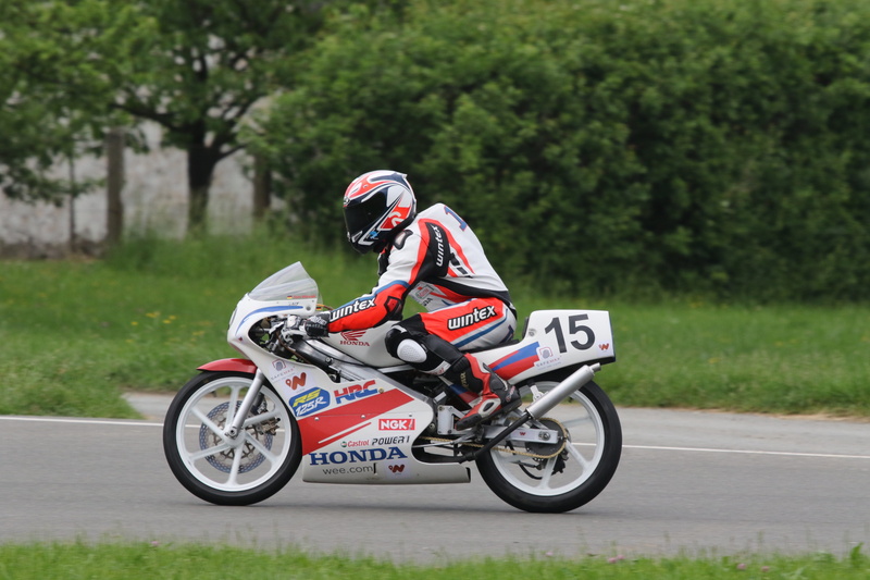motorcycle, ride, real people, sport, land vehicle, road, team limitless, sports race, mode of transportation, day, transportation, protection, motorsport race