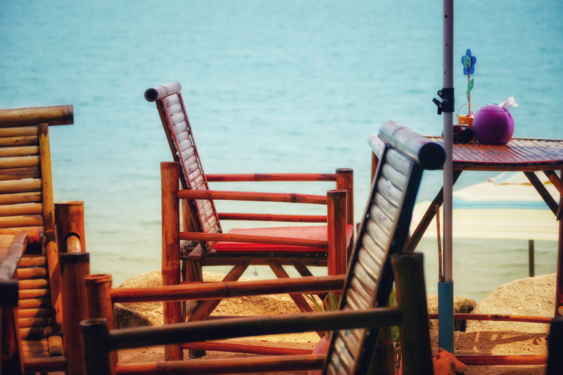 tranquility, chair, day, sea, beauty in nature, absence, vacations, travel, furniture pieces, empty, wooden chairs, chairs, sit, coast, beach, nature, bank