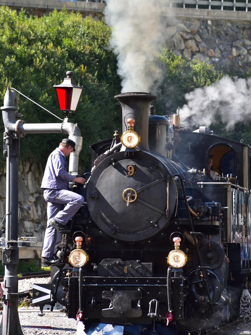 smoke - physical structure, protection, working, real people, steam locomotive, occupation, transportation, locomotive, public transportation, steam, pollution