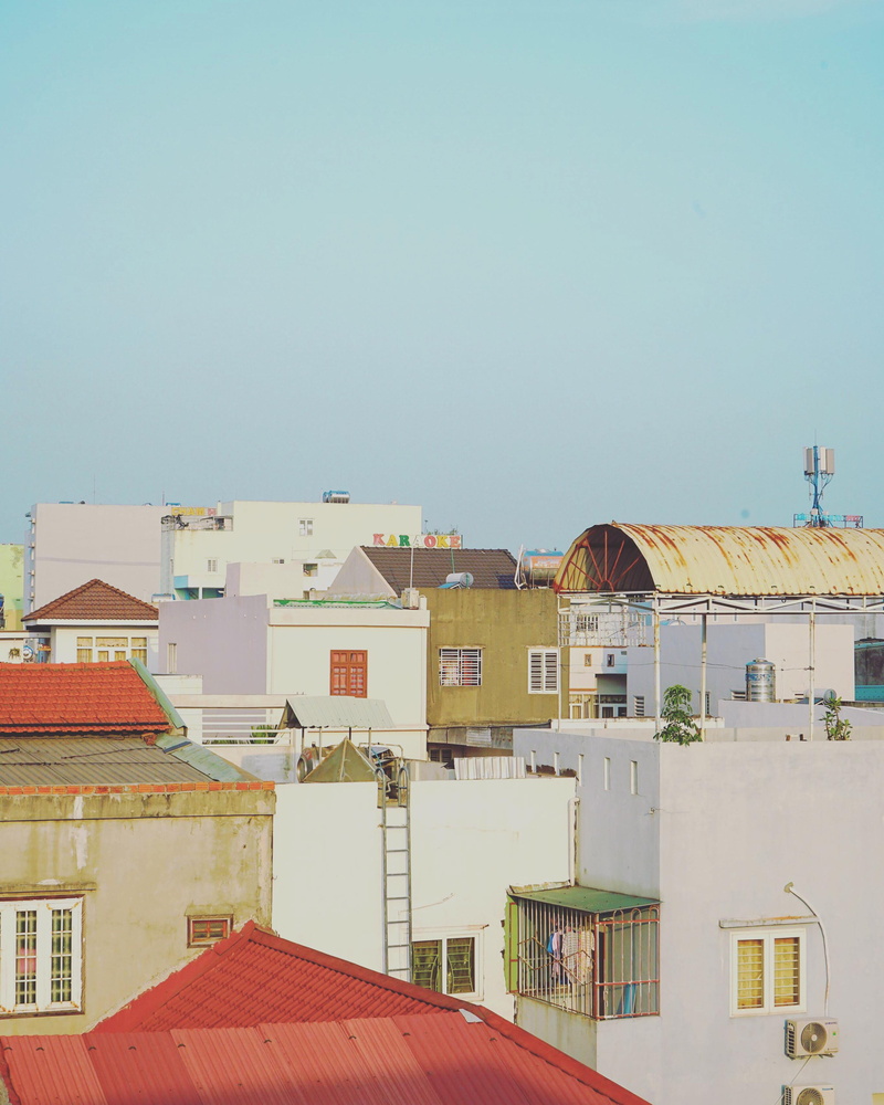 outdoors, built structure, city, pastel, building exterior, copy space, apartment, vietnam, danang, rooftop, blue, community, roof tile, window, architecture