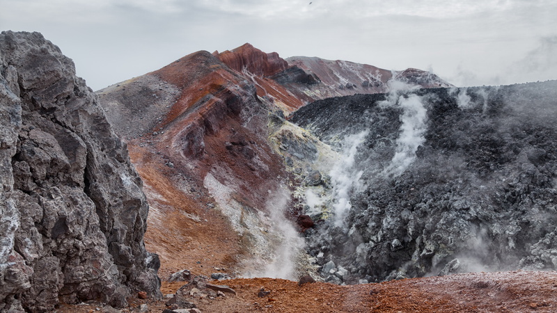 rock, sky, no people, environment, waterfall, water, motion, day, volcanic crater, rock - object, non-urban scene, mountain, beauty in nature, flowing water
