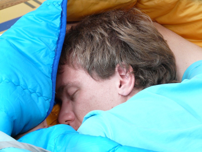 adult, 2K, man, furniture, people, resting, sleep, yellow, males, rest, eyes closed, blue, sleeping, relaxation, sleeping bag, lying Down, headshot, napping