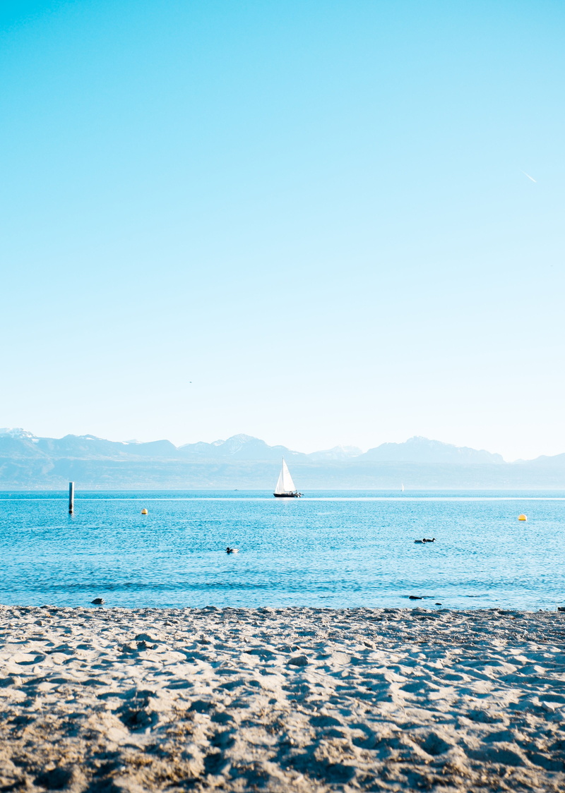 nautical vessel, beach, water, boat, outdoors, idyllic, land, sailboat, scenics - nature, no people, sun, tranquility, day, voile, lausanne, nature, place de la navigation