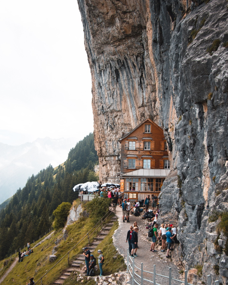 outdoors, group of people, large group of people, mountain, women, day, leisure activity, crowd, berggasthaus aescher-wildkirchli, restaurant, architecture