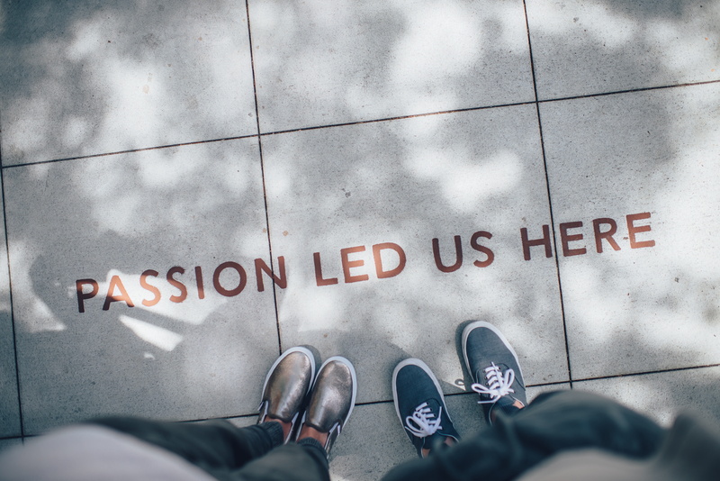 personal perspective, quote, passion, two, standing, low section, pavement, shoes, real people, body part, high angle view, human leg, journey, 5K, sign