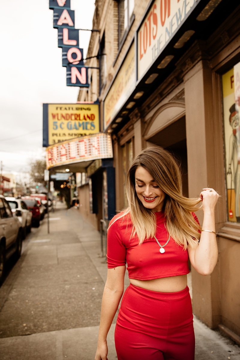 young adult, hair, united states, building exterior, apparel, skin, beautiful woman, communication, human, pavement, avalon theatre, red, one person, path