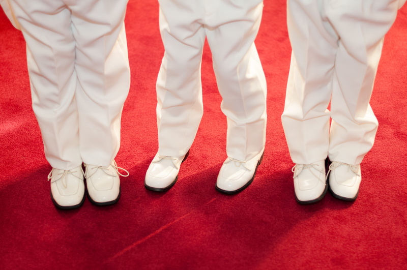 indoors, event, footwear, group of people, togetherness, premiere, shoe, white color, in a row, wedding, low section, side by side, human leg, kids, three