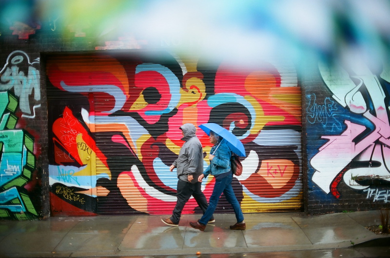 creativity, person, painting, men, urban, mural, art and craft, coat, casual clothing, two people, rear view, human, outdoors, lifestyles, leisure activity