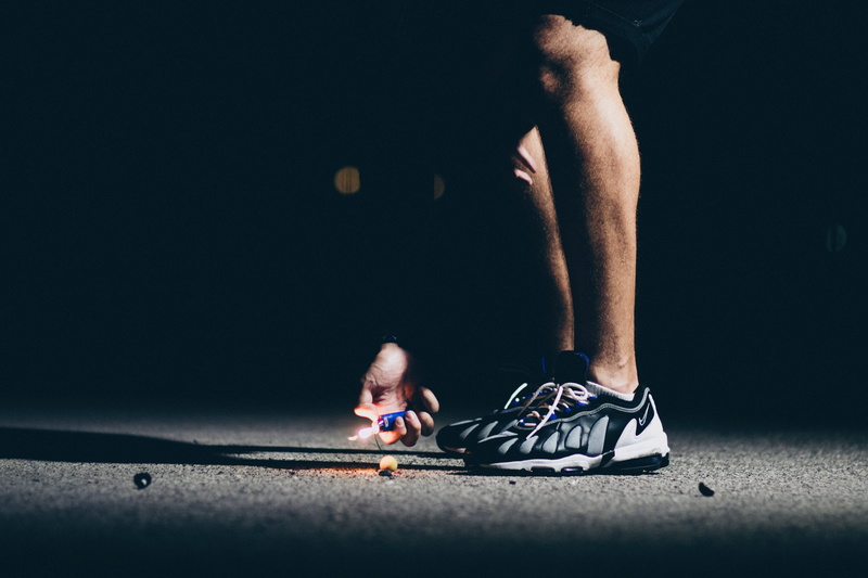 firework, human body part, united states, dark, smoke bomb, human leg, lifestyles, one person, body part, effort, running shoe, bic, exercising, sport