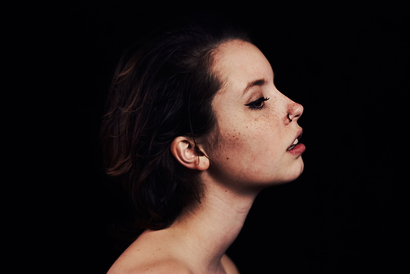 open mouth, profile, side view, bare shoulders, Skye Thompson, emotion, studio shot, human body part, depression - sadness, one person, looking, profile view