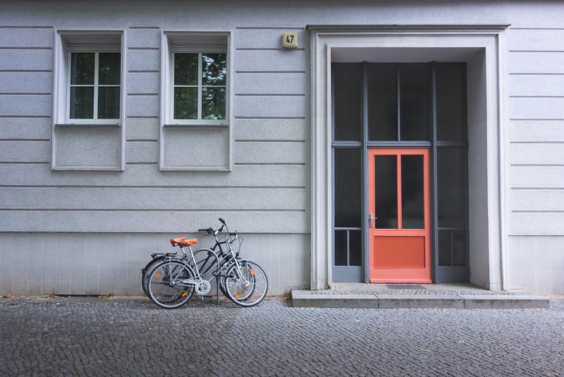 architecture, near, wall, outdoors, building, transportation, bicycles, residential district, wheel, berlin, sidewalk, city, building exterior, land vehicle
