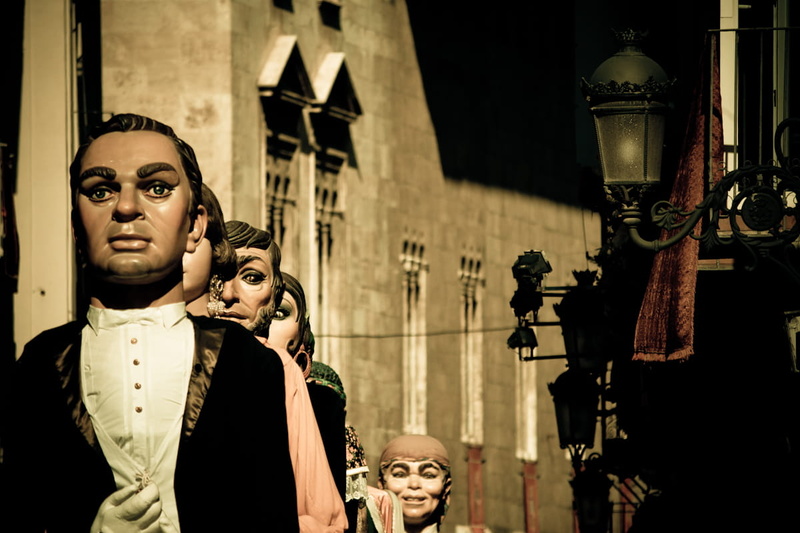 procession, representation, women, building exterior, city, adult, fashion, art and craft, group of people, mount, retro styled, low angle view, people