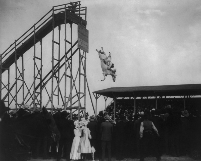architecture, day, women, vintage, black and white, mounted, tower, adult, real people, 1080P, jumping, horse, motion, outdoors, large group of people
