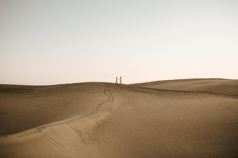 scenics - nature, arid climate, walking, remote, environment, solitude, dune, sky, land, 4K, distant, one person, non-urban scene, unrecognizable person