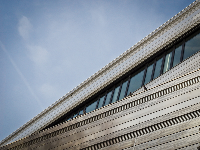 day, low angle view, directly below, Building, design, cloud - sky, facade, no people, Modern, sunlight, metal, built structure, contours, skyscraper, structure