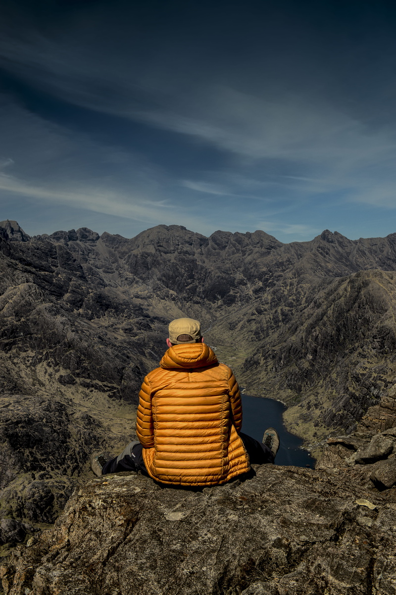 clothing, person, outdoors, rear view, apparel, human, one person, real people, day, emotion, highlands, warm clothing, soil, landscape, mountain, isle of skye