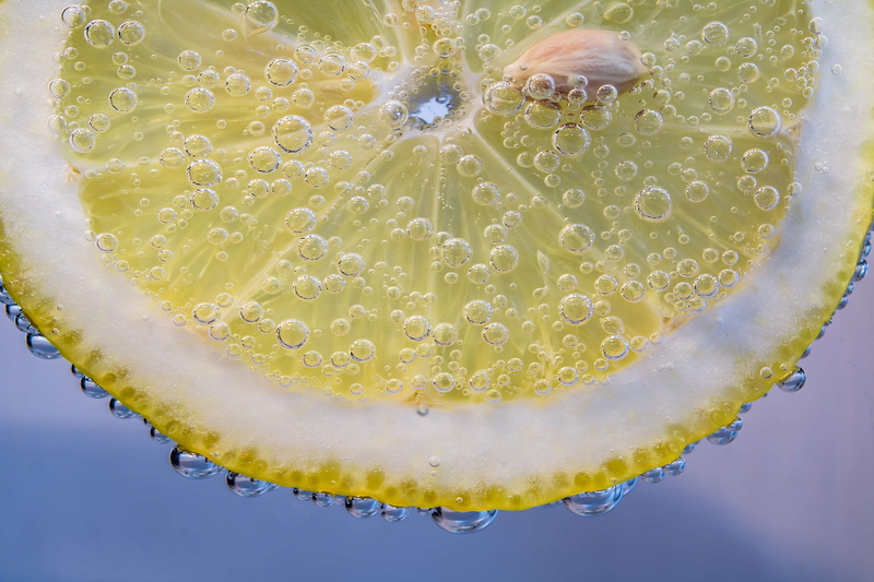 slice, yellow, purity, beverage, color, delicious, citrus fruit, fresh, no people, close-up, refreshing, liquid, close up, fruity, freshness, studio shot