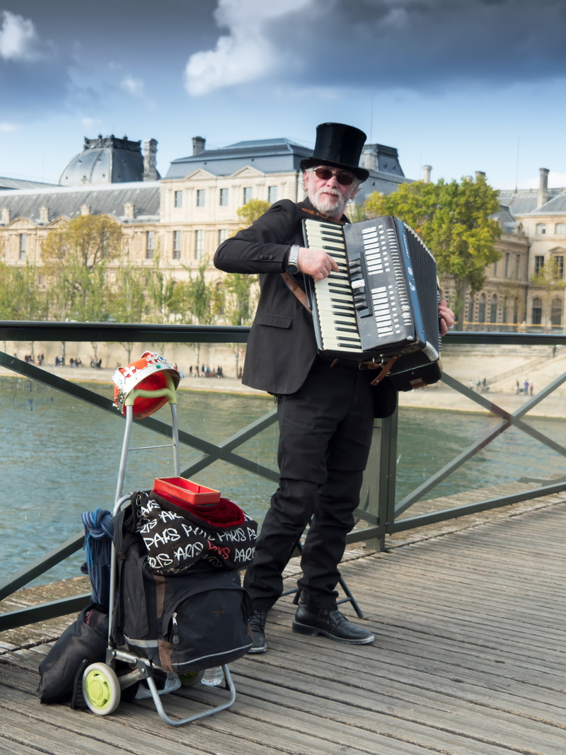 real people, young men, musical, leisure activity, street, accordion, architecture, canal, happy, front view, street musicians, artist, music, people, playing