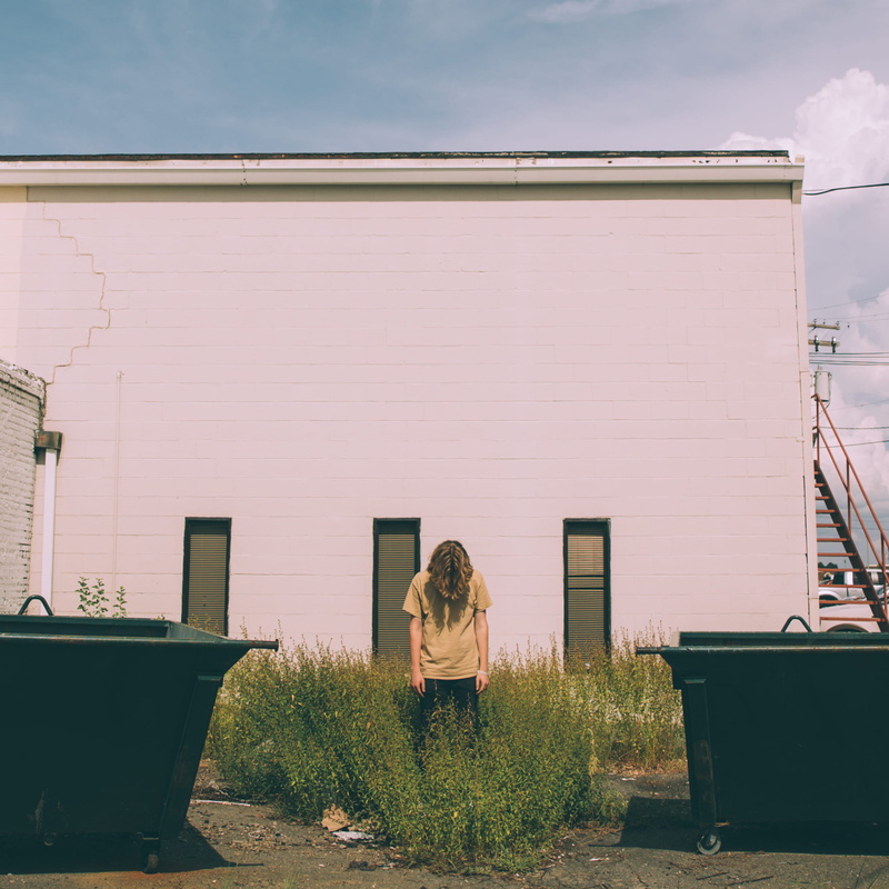 jar, planter, women, tire, lifestyles, daytime, united states, grass, casual clothing, window, tree, plant, pottery, 1080P, concrete, standing, wall, white