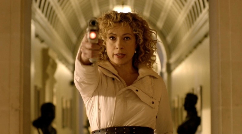 illuminated, people, Doctor Who, Alex Kingston, architecture, 720P, TV Show, portrait, brown hair, focus on foreground, adult, indoors, standing, looking at camera