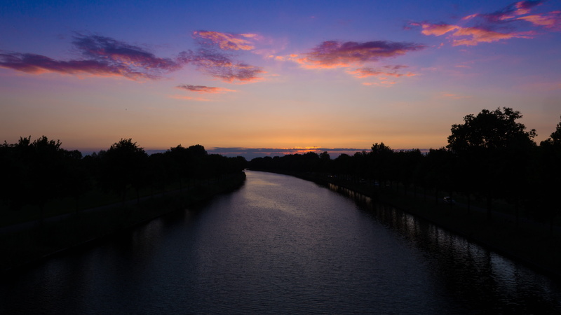 tranquil scene, landscape, water, nature, sunset, tranquility, beauty in nature, waterfront, enschede, tree, reflection, outdoors, silhouette, river, channel