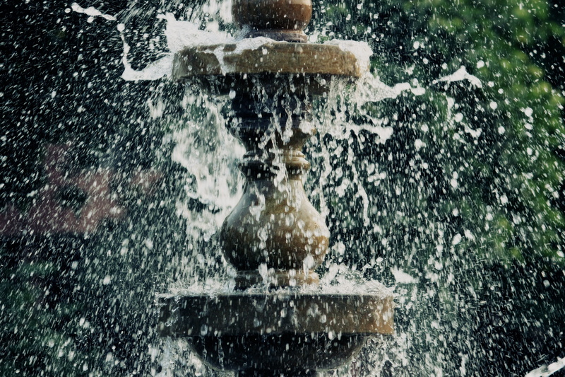 spraying, snowing, blurred motion, fun, one person, wet, fountain, outdoors, day, males, splashing, water, 2K, focus on foreground, drop, architecture