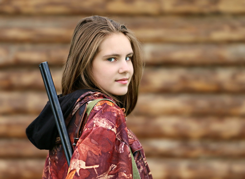 hunter, weapons, looking at camera, adult, focus on foreground, forester, hairstyle, the nature conservancy, trunk, one person, women, young adult, photo