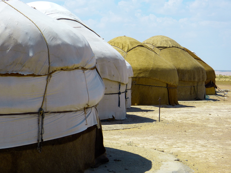 residential structure, outdoors, day, sand, building exterior, architecture, built structure, travel, dome, sunlight, yurt, land, nomads, live, no people