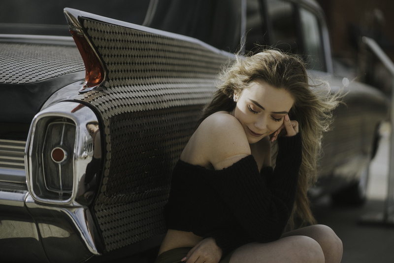 woman, grey, machine, casual clothing, muscle, car, mirror, spoke, female, clothing, focus on foreground, finger, shoulder, human, real people, hairstyle