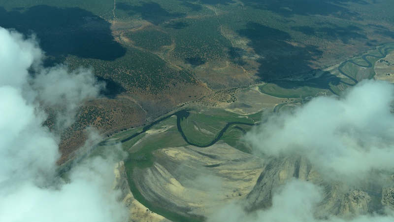 high angle view, tranquil scene, volcano, volcanic crater, environment, water, mountain, smoke - physical structure, aerial view, africa, beauty in nature