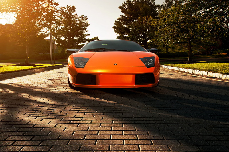 pavers, footpath, orange, vehicle, orange color, Murcielago, murciélago, Blik, shadow, road, sunlight, cobblestone, Lamborghini, on the move, 1080P, land vehicle